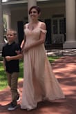 I bought this dress as a wedding dress and it could not have been more perfect!! The fit in great and is so much more comfortable than it appears. The fabric is soft and even though it came folded in a bag there wasn't a single wrinkle in it when I took it out to try on!! I love everything about this dress and will not only be purchasing other items from the site but also recommending it to everyone I know!! Beyond pleased!! Thank you!! - Taryn P.
