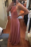 I bought this in the rusty rose for my sister's Arizona wedding. I was pleasantly surprised and loved it even more than I did in the picture. I usually get everything in a small but I had to exchange this for a XS because the small was a little baggy in the waist. The XS fits perfectly. If you are wearing heels the length is perfect, but I'm wearing flats so it's pretty long, but I also prefer it that way anyways. - Dani N.