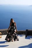 I was looking for a light and flowy dress to wear at a Santorini wedding. I ordered many dresses, but many of them seemed 'heavy' since I wanted something light and I fell in love with this one! The fabric is great, it is not heavy and doesn't get too wrinkled if you have to pack it. I arrived at the hotel and just hung it for few days and it was perfect! It was a huge success and the best part, I can wear it again for many other occasions! I cant wait to wear it again! I had to get it hemmed since I'm 5,1'. - Karin C.
