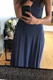 This dress is amazing but it's not a grey color. Photo will provide down below. - Daria H.