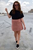 I am OBSESSED with this skirt and am considering purchasing it in more colors. My waist is a size 6, but my hips are a size 8, so I often have a difficult time purchasing bottoms. It fits my hips perfectly, but if I want to wear it higher up, it's a bit loose. I'm considering purchasing a medium when I purchase other colors. The pink is just absolutely gorgeous, and I've gotten several compliments on it. The color is perfect for summer, and it will transition excellently in the fall! - Martha U.