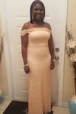 This is a very beautiful gown. I wore it to formal event and I got lots of compliments. Dress was fit perfectly and I was very impressed with the quality. - Rochelle P.