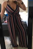 I'm 5'6" tall and this is long on me -- stepping all over it. With shoes it's not as bad, but i definitely need platform shoes with it. It's super cute, I haven't worn it yet and am not sure what I'd wear it to.. so i'm not sure if i'll keep it. It's cute but definitely seems a bit fancy for daily wear! - Emily T.