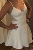 Love it!! It's a thicker material so it holds up nice and isn't see-through at all. The back lace is very flexible and the fit is phenomenal. I  can't wait to party it up in it at my bachelorette next month! - Cara O.