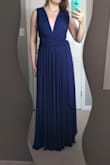 I was worried that this dress would be too long since I'm only 5'1". Truthfully, it is too long if I'm barefoot, but I can wear heels around 4" and then it's the perfect length. Thank gosh for that too! This dress is so great! The material is soft and comfortable and so versatile! The looks you can make with it are endless!! It can be as modest or revealing as you wish. I can't wait to have a reason to wear it! - Darlene M.