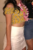 Be prepared that this top is VERY cropped, but it's super cute and flattering with high waisted shorts! Ordered a L and I'm glad I did. - Sarah B.