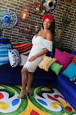 Wore this to my fiesta themed engagement party. Lots of compliments. True to size, fits well/form fitting. - Chudney R.