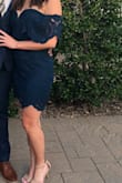 Such a fitting dress that shows off your figure, even if you're feeling poochy that day. Beautiful color, and the padded bra helps a ton! - Lindzey R.