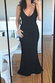 I bought this dress for my 40th Birthday. Got it hemmed but they cut it too short so I rushed ordering it in Navy as Black was out of stock. Both colors looked amazing. I felt so beautiful in this dress. The fit was perfect for me and what I was looking for. And in the end I am happy it was Navy I ended up wearing. Highly recommend this dress. I may cut the black to the knees and have a little black dress. I should have not hemmed it and wore 4'' heels. - Shauna B.