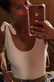 I love this because it's simple but very cute. It isn't too low cut so it looks very classy on but is also fitted and very figure flattering to make it sexy at the same time. It can be worn with anything and looks good on all different body types! - Elizabeth S.