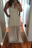 This dress is beautiful. It's a perfect fit. The material isn't a cheap material and I am a heavy chested girl and this dress I am able to wear without a bra. I was considered it was going to be see through and it's not! Highly recommend! - Angela C.