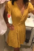 It's a wrap dress so it adjusts to your size. Cute enough to wear out, yet modest enough to wear for work. Decent quality but I dropped one star because I think it should be closer to $40 based on the quality. Mind you it will probably look better once I steam it. - Melissa T.