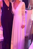 Wore for my rehearsal dinner. Doesn't fit perfectly but did its job. If I wore for an actual wedding dress, would need a lot of alterations because it's loose everywhere. - Melissa T.