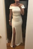 I originally purchased an extra small because I read several reviews that this item runs large, however the extra small did not look right on my body type. The small fit perfectly and will be wearing it for my special day. I purchased a belt and plan on having it attached. The fabric is stretchy and hugs your curves in all the right places. Love it! - Joan S.