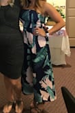 Love. Love this dress!!! A lil tight in the chest area but there's room to wiggle in it. The back is stretchy enough to fit OK. - Cheryl F.