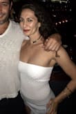 I love this. Top is definitely tight but not uncomfortable and after a whole night of dancing didn't seem to fall down at all. Also great that you don't have to wear a bra! - Kate M.