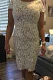 Pretty dress but the material was tight. This dress is not good for summer because of the material. The back of the dress was a lil loose too so it was uncomfortable. - Cheryl F.