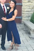 This dress is perfect for a wedding! You can even wear it to a nice dinner. The slit isn't too high. Very classy dress. Got many compliments on it! Would highly recommend buying. Fits true to size. The material is nice and stretchy too. - Jackie P.