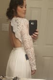 The skirt fit perfectly! but the top was too big. Because the fabric is so heavy, it hung off of me. Great quality and really beautiful, just a bad fit. Sleeves were baggy and too long also. A medium would have been too tight on my waist but a large too big in the shoulders and bust. The back is beautiful though! - Molly F.