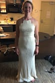 This was a pretty dress, I was looking for a budget friendly dress for a courthouse wedding. The cream color did not do it for me. The neck line was unique and the material was comfortable but I ended up returning this dress. I am tall and there was plenty of length which was a nice surprise! - Samantha G.