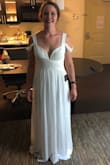 This was a beautiful dress! It was way too big, I had an extra 4 inches around the torso that could have been taken off. I usually wear a large so I would suggest ordering a size down, however the length was great! I found a different dress from Lulu but this one could have been pretty! - Samantha G.