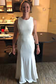 Very flattering dress, it was a little loose on the torso so I ended up returning it. However the fabric and zipper were high quality and were very comfortable! The length was enough for short heels but not much more! - Samantha G.