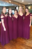 I wore this dress as a bridesmaid and loved it! It's so flattering. The only thing I did not love was how the sleeves restrict your arms. It wasn't great for dancing because it's painful to lift your arms above your head. Also, this dress is more chesty than the photos appear. If you have a large chest and don't want to show it off, this dress may not be for you. Overall, a gorgeous gown that I will definitely be wearing again. - Kelly H.