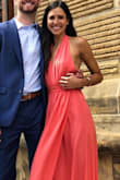 The dress runs true to size. It looks just as pictured. The materials is really light and gets wrinkled easily, but it is extremely comfortable. I received many compliments on this dres. I would recommend! - Jennifer M.