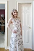 Wore this to my bridal shower, and it was a big hit. The dress is beautiful, but a little small in the chest which is strange for me bc I am only an A cup. I could not wear my push-up back less bra with this bc it made it too tight. I had to have it hemmed, and I had to buy a slip as it was see through, but the dress is really beautiful and was perfect for the occasion so no regrets! - Morgana K.