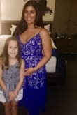 I wore this dress to a rehearsal dinner for a summer wedding I was a bridesmaid for in Philadelphia. The length was great and had a fun hemline. The color completely popped and I received compliments all night. The top was a little loose, but since the straps were adjustable it was fine. I ordered an extra large thinking it would run too small (I'm usually a medium or large). I would order just a large for next time! - Julie P.