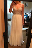 This dress is gorgeous in person. I have already bought a $2000 wedding dress but would wear this in a heartbeat if my mom wouldn't have a conniption! I've decided to wear this for my reception dress-so pretty and comfortable! - Jodi B.