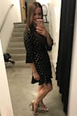 The small did fit me, but barely. It's tight around the bust, but I wouldn't have wanted to size up, either. Very cute with gold heels! - Erin C.