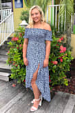 The fabric doesn't wrinkle easily. Fits good. The slit is the prefect length. This dress can be worn all year round. I took it with me on my last vacation to Florida but can't wait to take it with me to Napa this fall. The picture included is my daughter. - Glenda W.