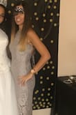 This dress was perfect. The design & color are stunning. It fits true to size & looks very elegant. Can't wait to wear it again. - Maria E.
