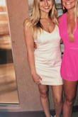 Perfect dress! Fits beautifully and is very flattering! Got many compliments! It is made with thick, high quality material and is not see-through at all. It was a little loose around my stomach/hips, I may have been able to get away with an x-small. Still absolutely beautiful. - Tricia L.