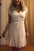I ordered this dress an engagement party. It's a bear to button and bulges a tiny bit in the chest but I'm very busty. It will be easy to pin. It's super comfortable and got a "wow!" from the fiance! I haven't ironed/steamed it yet but the material is really nice and seems unlikely to shrink much. - Bailey D.