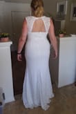 I bought this dress in a whim while looking at wedding dresses online. Lulu's has a decent return policy so I figured I had nothing to lose.  I just received the dress and it's perfect. Good quality, fits well without shapewear, a little stretch so will be good for dancing. For my height the length is perfect with heels. I'm going to wear flats so I'll have the front shortened just a bit. Can't wait for my wedding! - Caitlin S.