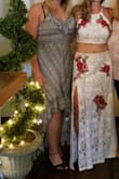 This two piece is just beautiful, I just wore this to my bridal shower. I did, however, have to yet it altered. I thought I was going to have to have it taken out because there's this super oppressive elastic band in the waist, but once my seamstress removed that, she had to take the waist in a little bit. She also had to shorten the hem. The top fit perfectly! I wear them separately and together. - Kayla G.