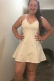I love this dress! The material is very good quality and has a good weight. The skirt is double layered. I was worried it would be too short because I am tall and have a booty, but it is long enough! It's definitely a mini dress, but it covers everything! I am so excited to wear in on vacation in Hawaii! - Kristen P.