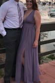 Absolutely loved it! Beautiful color. Wore it for a summer wedding and it was great. Material didn't show any sweat because the lining. The slit also helps you get air. Just wore stickies. Probably could have used double sided tap too but I managed. Would be a great dress for bridesmaids too! - Kim G.