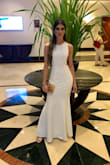 I loved this dress!!! It was perfect. I give it 10/10. The material is thick but flowy. Everything about it was incredible. - Stephanie A.