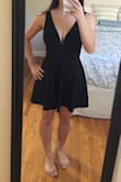 This dress is really figure flattering and hides the belly. I plan on wearing this for a wedding. I love how the dress looks on me. It could do without the shorts though since it adds extra fabric and made me look bigger. I ended up cutting the shorts out and the skirt flows better. It is a little loose around the chest area without a bra for me. Overall, great dress! - Michelle N.