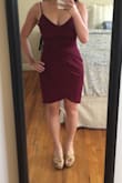 I really like this plum color! The dress is figure flattering. I like that the fabric is thinner but not too thin. The length is about 2-3 inches too long for me since I'm only 5 feet. It's hard to find nice stylish dresses in store like this for short people so I'll take what I can get. Good for a night out or a wedding. - Michelle N.