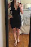 The other reviews were right on! This dress is extremely slimming and figure flattering.  It is a bit long for someone 5 feet but still sexy. The shape of the dress really gives you that hour glass look. Love it! - Michelle N.