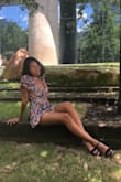 This fits well with my petite body. The print is colorful and loud and people take notice. Very flowy, just be careful in the wind. - Valinda J.