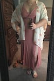 I love the slits in the dress - super comfortable and flowy. The fabric is really soft but 95% rayon = cheap and it will eventually get nubby. The style of the top is fine but not particularly flattering. A bit clingy so this is not something I would wear on a day that I feel self conscious about my tummy. Unless I wear something over the top, it is too casual for the wedding I bought it for... will prob still keep it to wear out normally because I like the color and bottom half. I consider scrapping the top half and just making it a skirt tbh. - Ginger P.