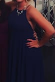 I cannot say enough about this dress. Wore it to a wedding and got so many compliments I had to buy it in green as well. Good for Winter or Summer events. For someone with a large bust I expected to be peeking out the sides but the dress is so well made and sturdy that I had no issues. Flow is gorgeous, I would highly recommend! - Michaela K.
