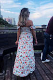 I have been an avid shopper for a few years now, and this is by far my favorite purchase to date! Fits true to size and though I'm short, nothing needed to be hemmed. I would recommend wearing a strapless bra is you have a larger chest though. It just gives it a better shape since there is absolutely no support. But after that, it fit perfectly! - Steffi L.