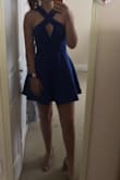 Loving the color and design of this dress. I'm getting it for sorority recruitment so hopefully it will be an eye catcher!! I am 5'6, and it comes to my fingertips. - Ashtyn K.