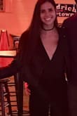 This body suit is extremely comfortable. It looks good with shorts, jeans, skirts, etc. Fits true to size! Shirt layered under leather jacket in attached photo. - Jennifer M.